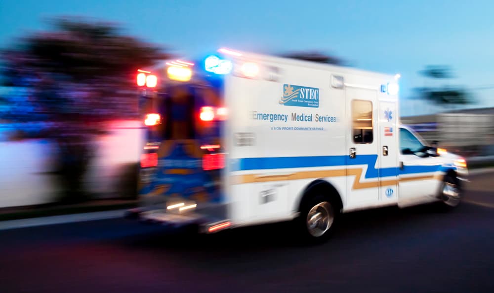 Ambulance at night with emergency lights